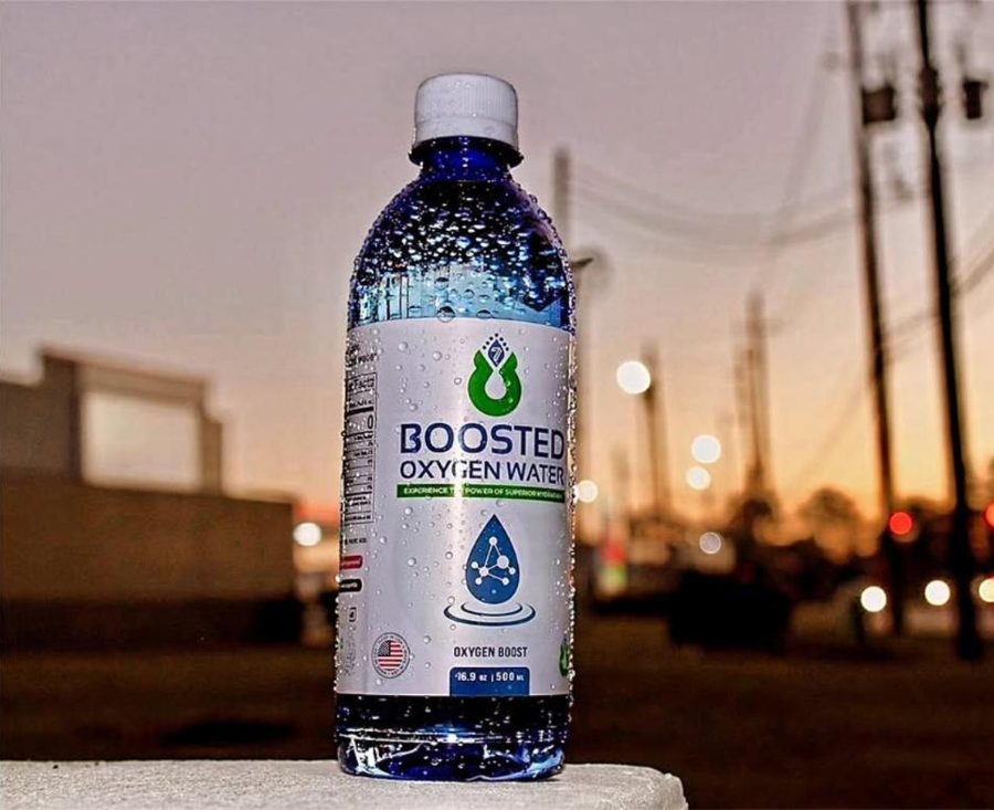 Boosted bottle covered in condensation at sunset